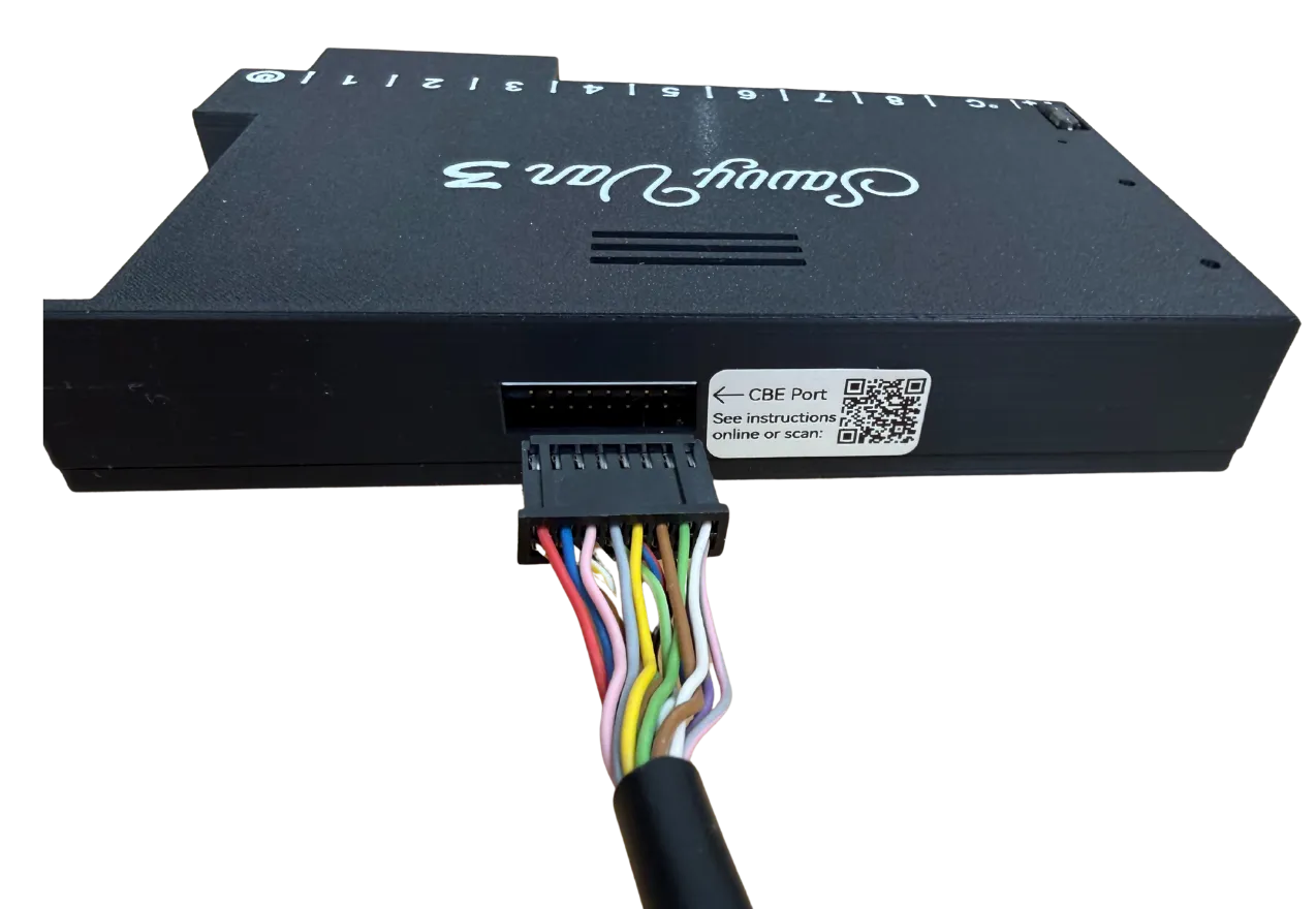 The rear of the SavvyVan3 CBE interface board, showing the port labelled CBE with the 16-way cable plugged in