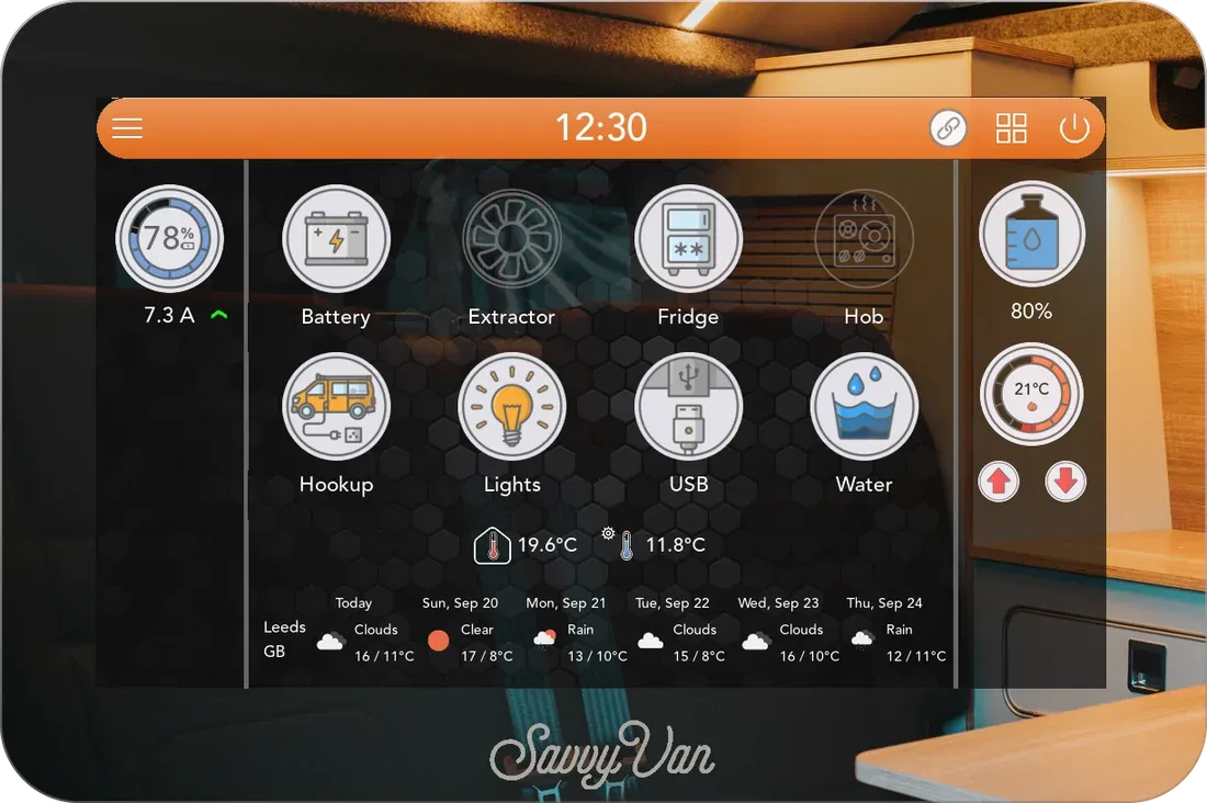 The mirrored screen switched on with the orange theme: the home screen's top bar and tiles showing through the mirror