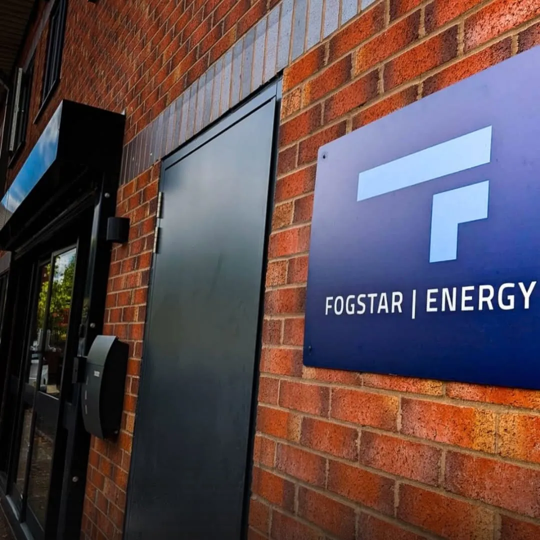 The Fogstar Energy sign on the brick wall outside their offices