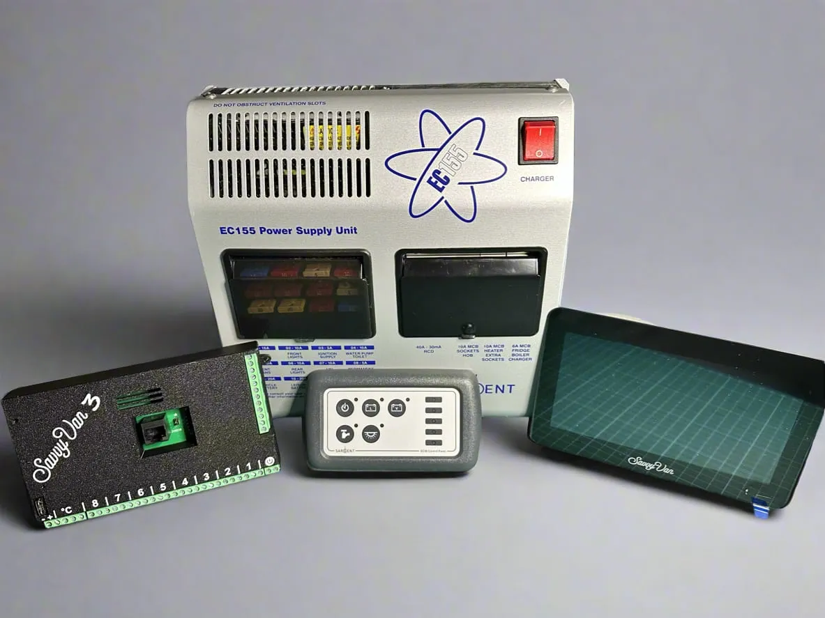 A Sargent EC155 power supply unit with, in front of it, the SavvyVan3 control board, the original Sargent EC50/EC51 control panel it replaces, and the SavvyVan3 touch screen