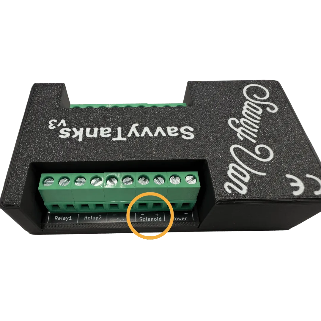 The SavvyTanks V3 module with a gas solenoid wired to its Solenoid terminals