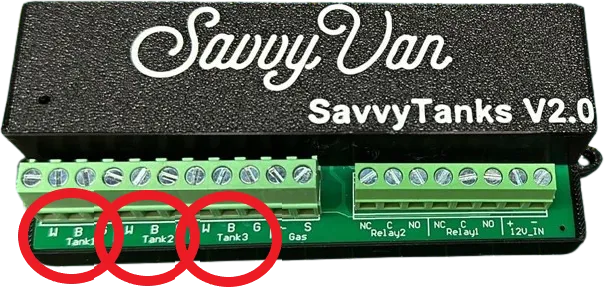 The SavvyTanks V2 module with the three tank terminal blocks circled along the front edge