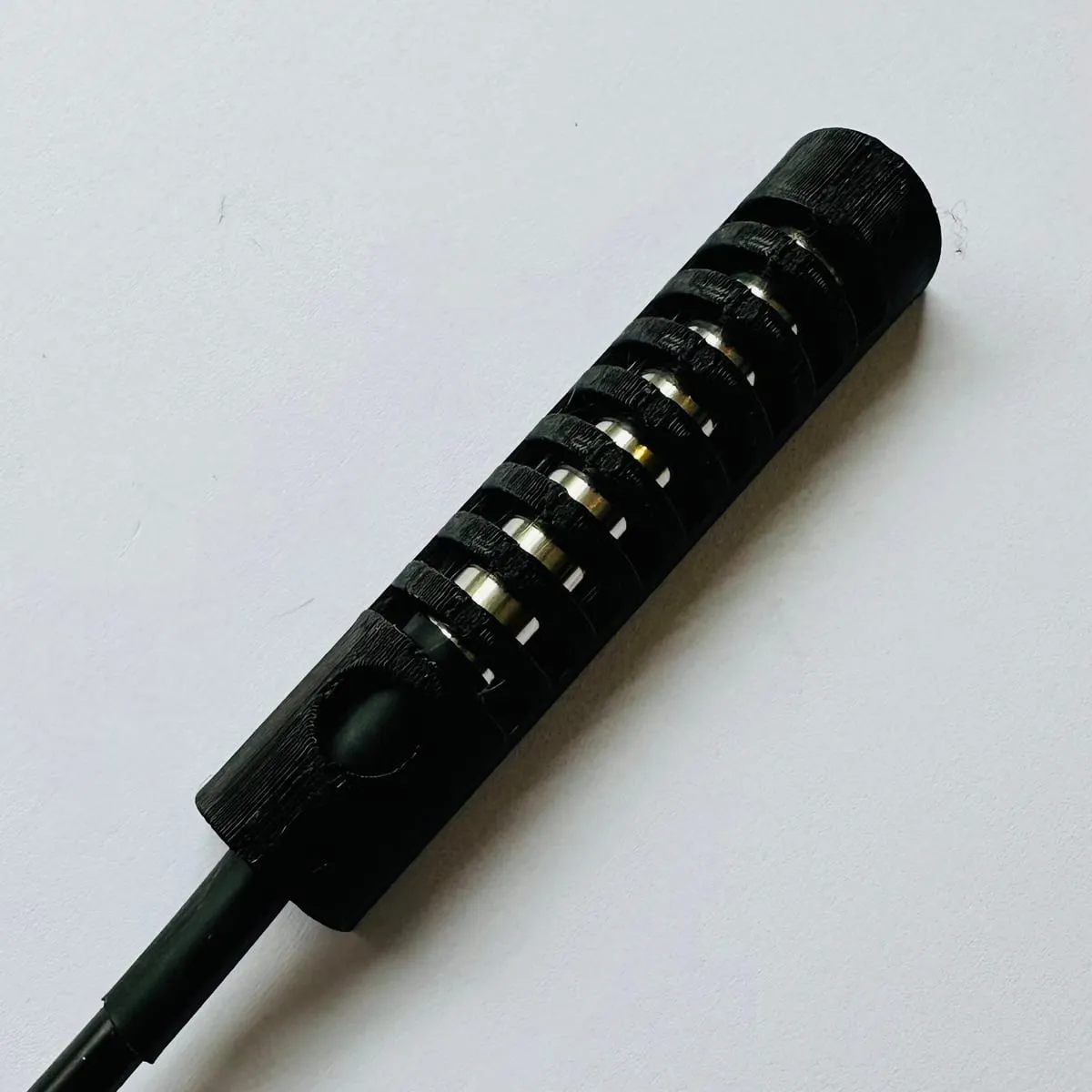 A SavvyVan temperature probe - a small stainless sensor on a three-core cable with bare tinned ends