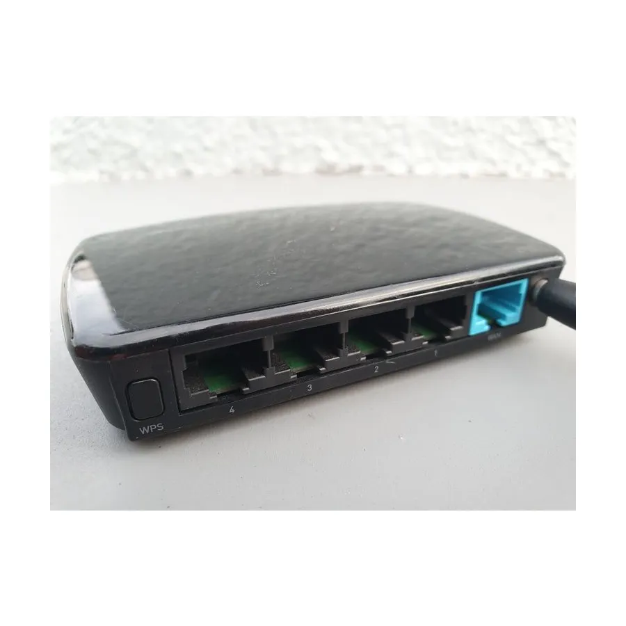 A small WiFi router of the kind that gives a van its own connection